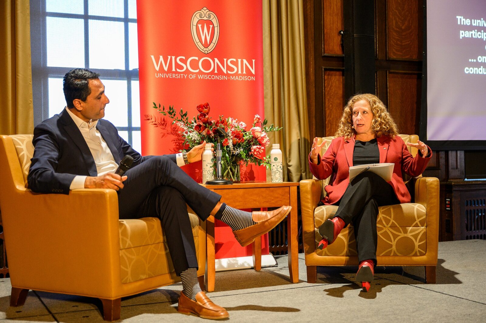 Eboo Patel and Chancellor Jennifer Mnookin having a discussion on stage.